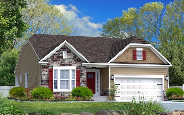 craftsman house with a front yard and a garage