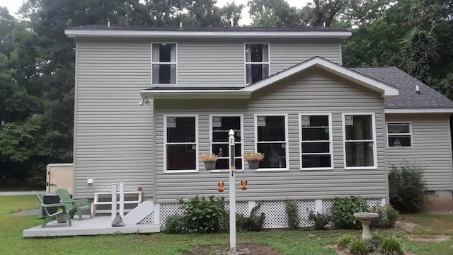 back of house with a patio