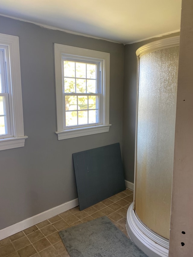 bathroom with tile patterned floors