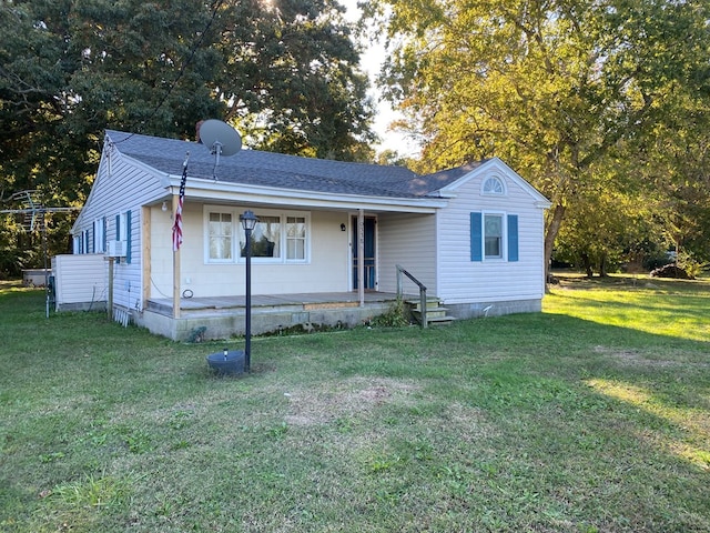 view of front facade with a porch and a front lawn