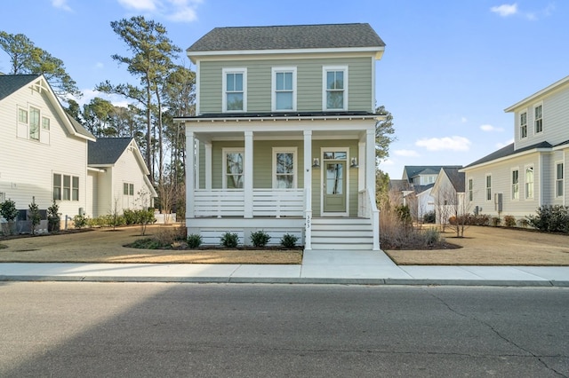 view of front of home featuring covered porch