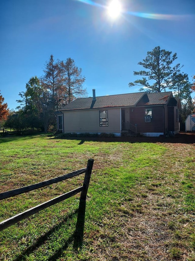 view of front of home with a front lawn