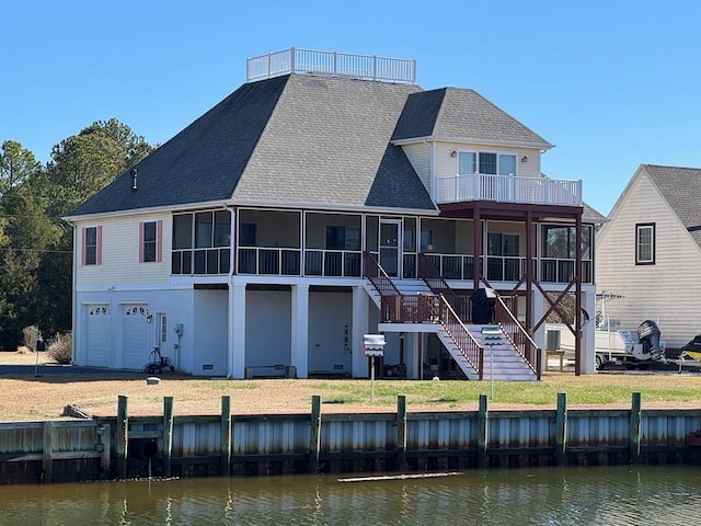 20444 Baldpate Ln, Onancock, VA 23417 - rear view of property with a sunroom, a water view, roof with shingles, a balcony, and stairs