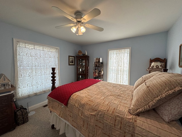 20444 Baldpate Ln, Onancock, VA 23417 - carpeted bedroom featuring ceiling fan and baseboards