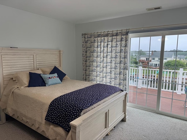 20444 Baldpate Ln, Onancock, VA 23417 - bedroom with access to exterior and carpet