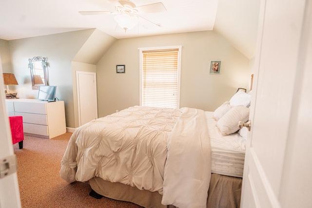 bedroom featuring lofted ceiling, carpet floors, and ceiling fan