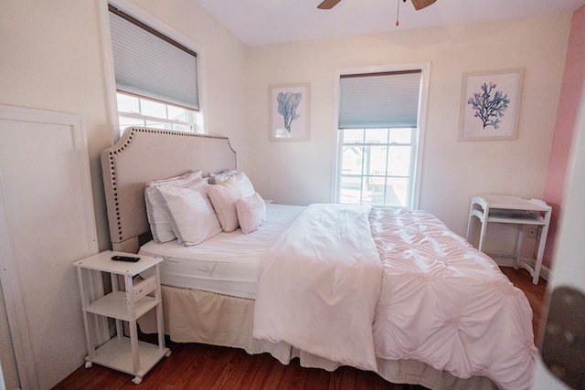 bedroom featuring dark wood-type flooring and ceiling fan