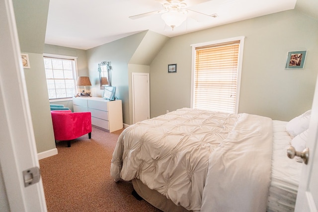 bedroom with lofted ceiling, carpet floors, and ceiling fan