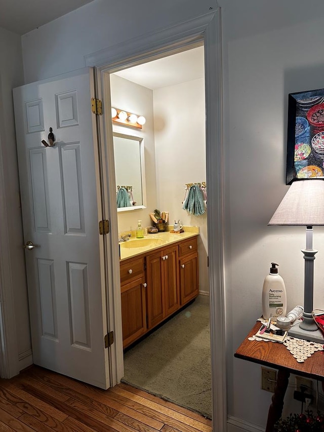 7086 Long Point Rd, Exmore, VA 23350 - bathroom featuring wood finished floors and vanity