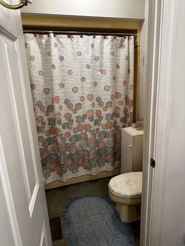 bathroom featuring toilet