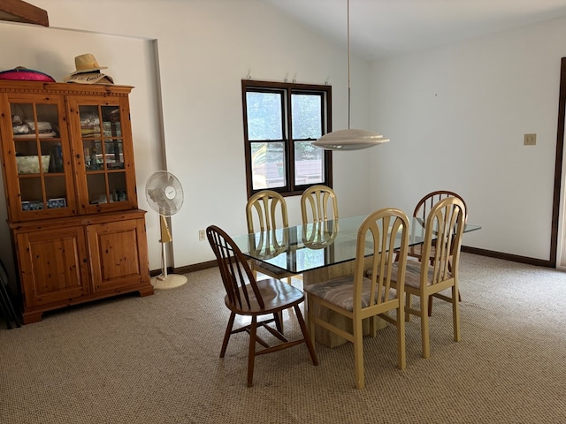 26491 Mason Rd, Bloxom, VA 23308 - dining area with carpet floors and vaulted ceiling
