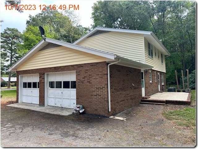 view of home's exterior with a garage