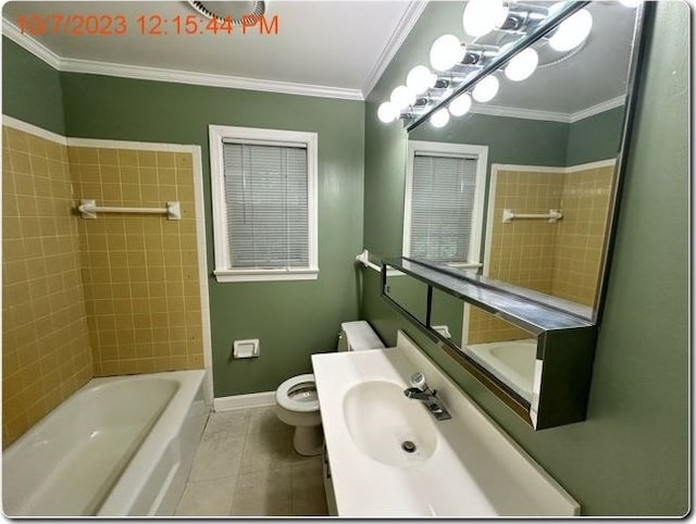 bathroom featuring tile patterned floors, vanity, toilet, and crown molding