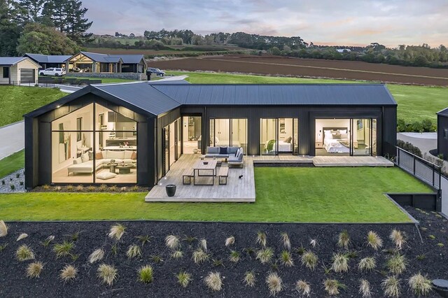 contemporary house with a garage and a mountain view