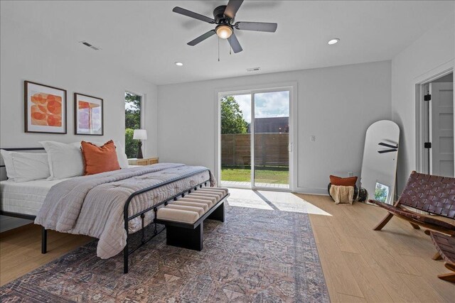 22231 Verlinda Lndg S, Cape Charles, VA 23310 - bedroom with access to outside, wood finished floors, recessed lighting, and a ceiling fan