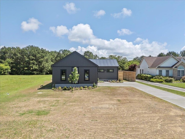 22231 Verlinda Lndg S, Cape Charles, VA 23310 - modern inspired farmhouse featuring driveway, a front yard, and metal roof