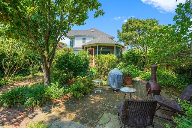 4282 Main St, Chincoteague, VA 23336 - view of yard with a patio and a sunroom