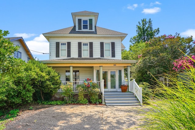 4282 Main St, Chincoteague, VA 23336 - american foursquare style home featuring covered porch and a shingled roof