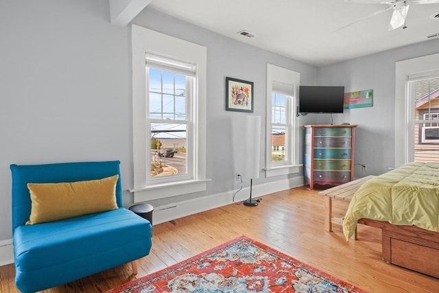 4282 Main St, Chincoteague, VA 23336 - bedroom with wood-type flooring and a ceiling fan