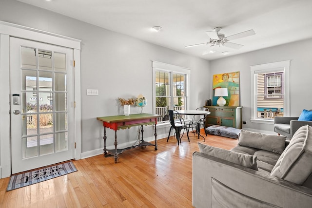 4282 Main St, Chincoteague, VA 23336 - living area with ceiling fan and light wood-style flooring