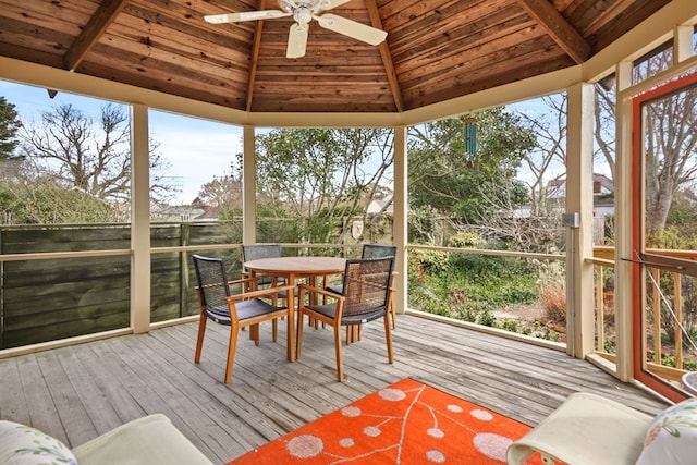 4282 Main St, Chincoteague, VA 23336 - sunroom with ceiling fan, vaulted ceiling, and outdoor dining area