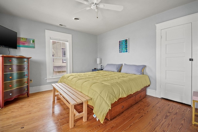 4282 Main St, Chincoteague, VA 23336 - bedroom featuring light wood finished floors and a ceiling fan