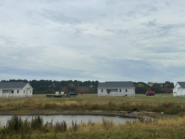 view of yard with a water view