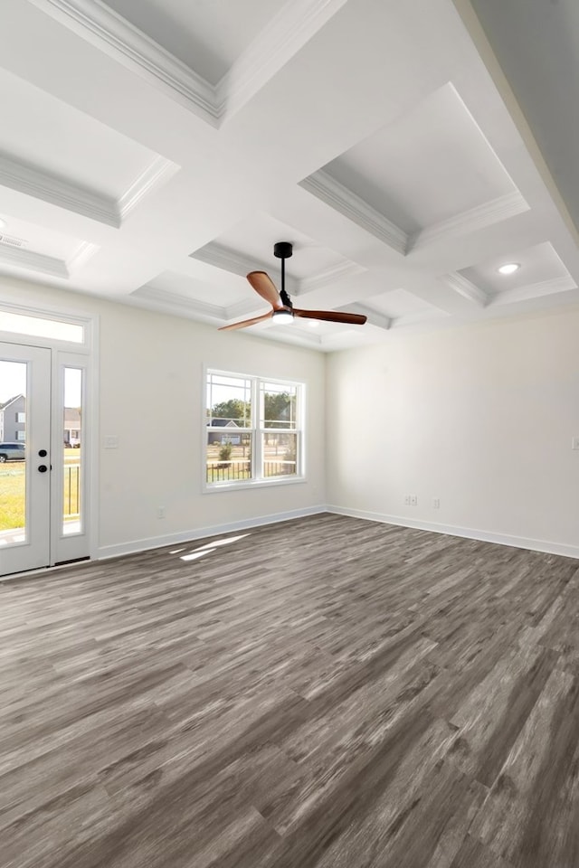 unfurnished room with beamed ceiling, ceiling fan, and coffered ceiling