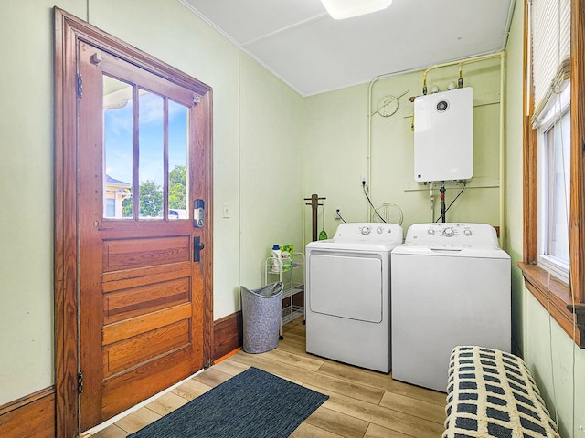 laundry room featuring separate washer and dryer