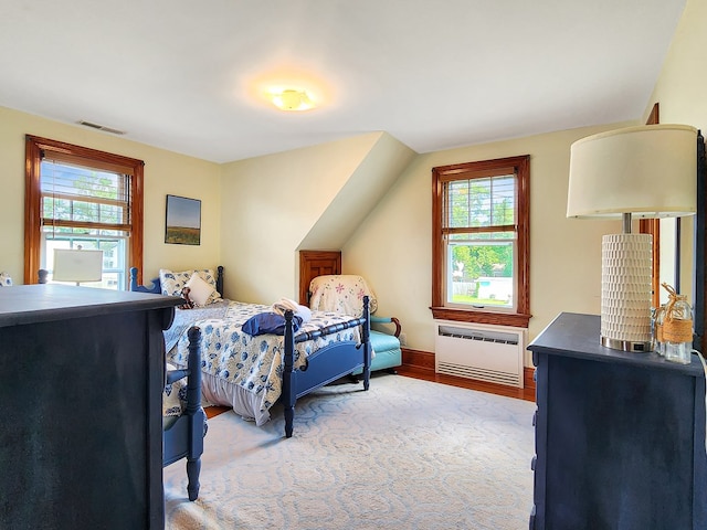 bedroom featuring multiple windows