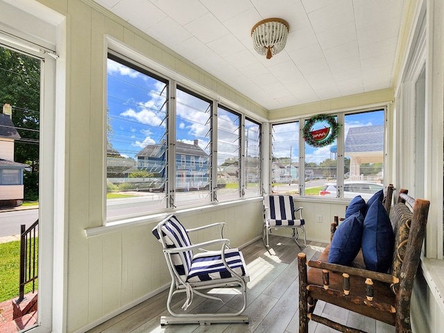 sunroom / solarium featuring a healthy amount of sunlight