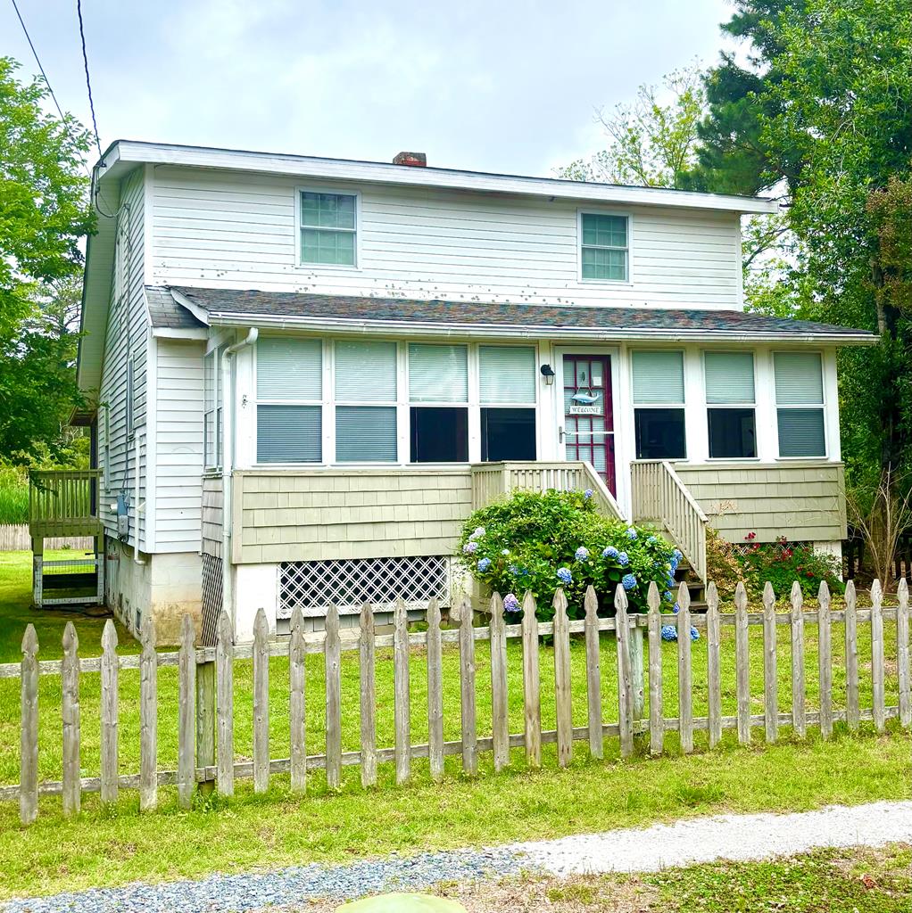 20182 Allen Ln, Onancock, VA 23417 - view of front of property with a fenced front yard, a chimney, and a shingled roof