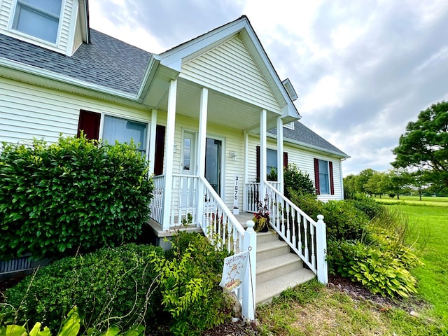 view of front of property featuring covered porch