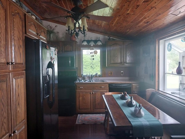 kitchen with sink, a healthy amount of sunlight, wooden ceiling, vaulted ceiling, and black appliances