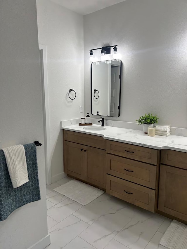 22199 Verlinda Lndg S, Cape Charles, VA 23310 - bathroom featuring marble look tiles and vanity