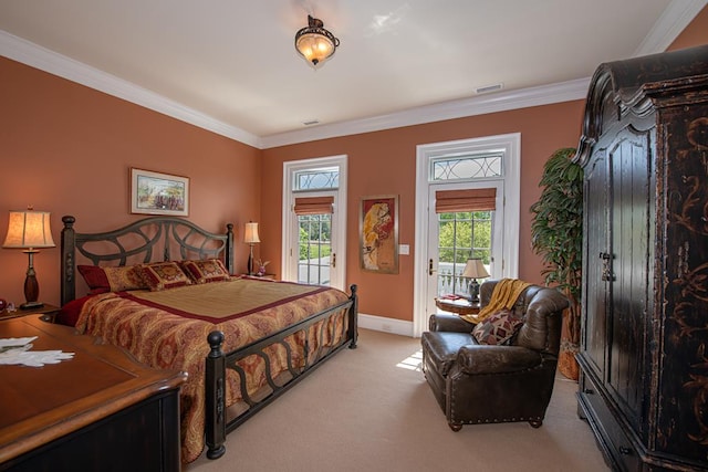 bedroom featuring access to exterior, crown molding, and light carpet