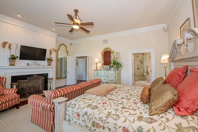 bedroom featuring connected bathroom, ceiling fan, and ornamental molding