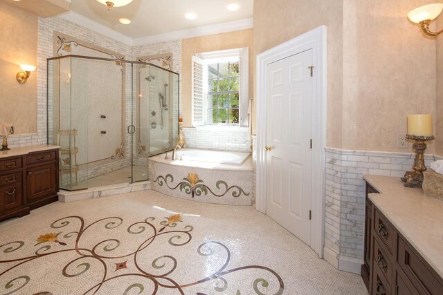 bathroom featuring tile walls, a shower stall, tile patterned flooring, crown molding, and a bath