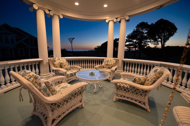 view of patio terrace at dusk