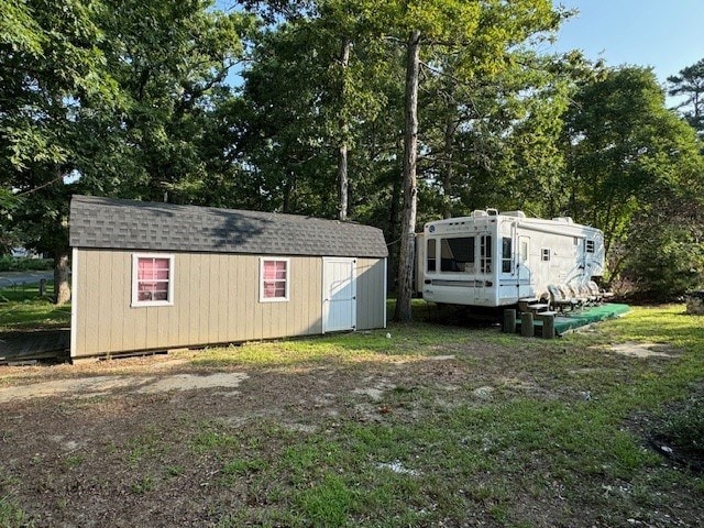 5196 Blue Heron Dr, Horntown, VA 23395 - view of shed with view of scattered trees
