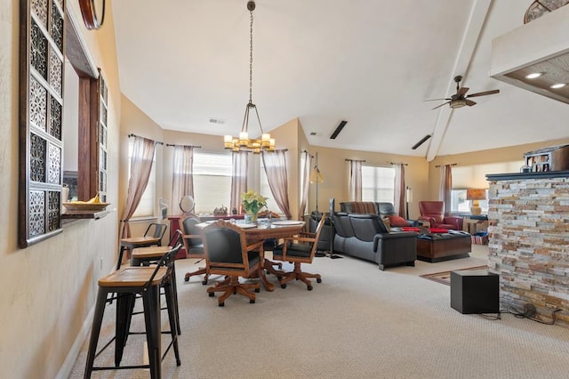 carpeted dining area featuring high vaulted ceiling, beam ceiling, and ceiling fan with notable chandelier