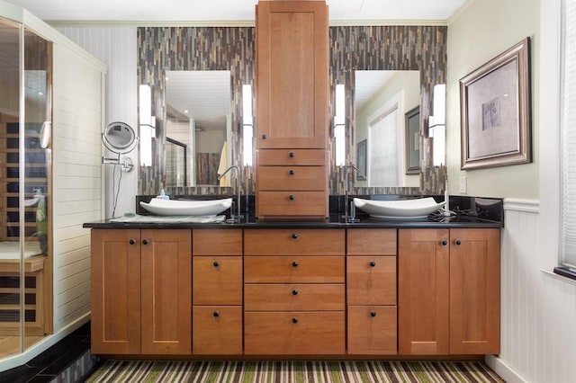 bathroom with vanity and ornamental molding