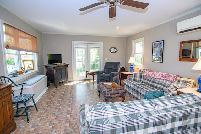 living room with a wealth of natural light, brick floor, a wall unit AC, and ornamental molding