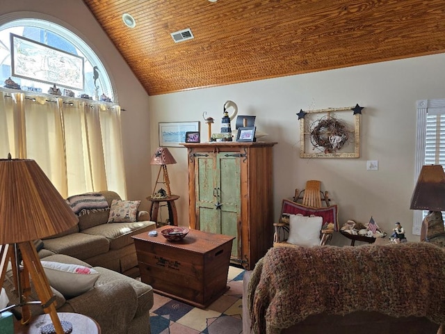 living room with visible vents, high vaulted ceiling, and wooden ceiling