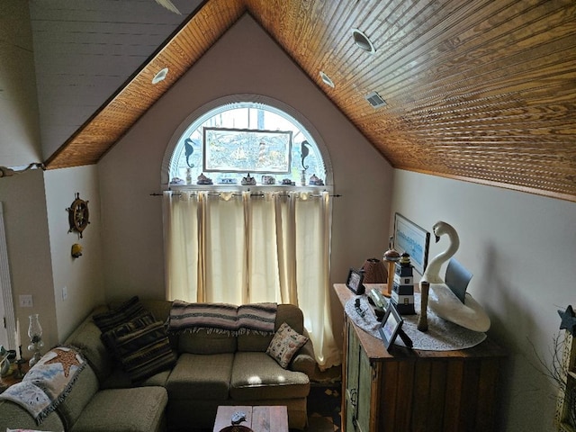 interior space with visible vents, vaulted ceiling, and wooden ceiling