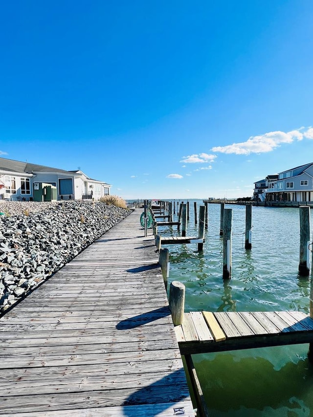 view of dock with a water view