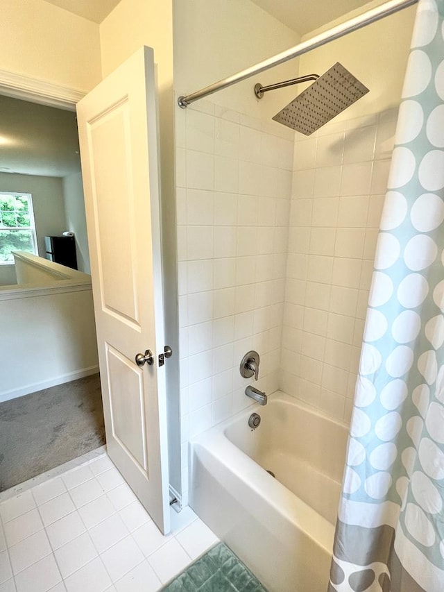 bathroom featuring tile patterned flooring and shower / bath combo with shower curtain