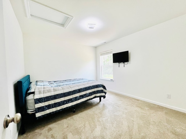 bedroom featuring carpet