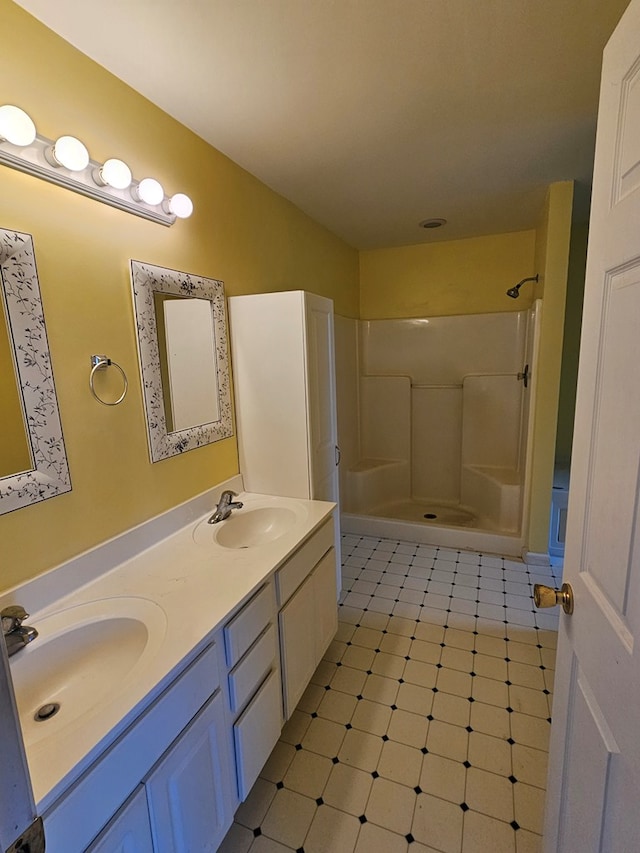 bathroom featuring vanity and walk in shower