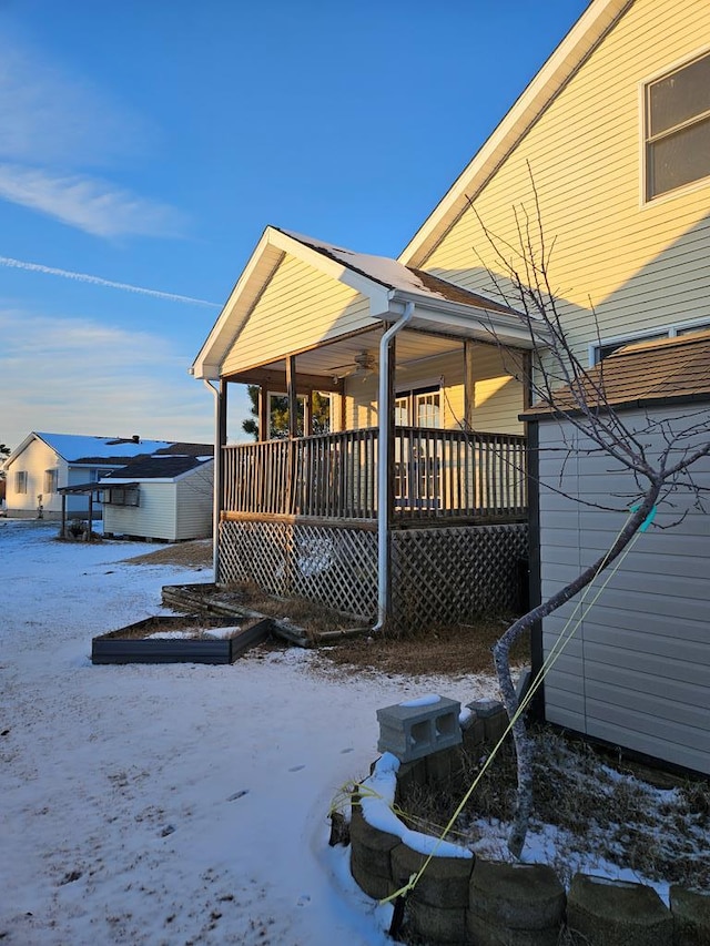 view of snow covered property